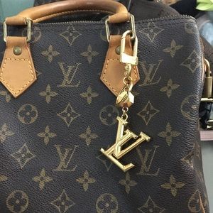 Louis Vuitton Pte Cles LV Facettes gold bag charm